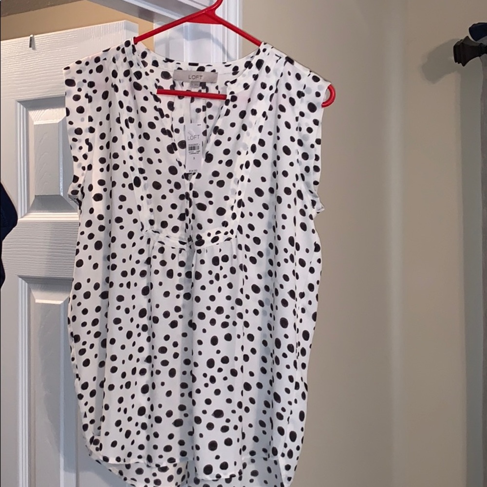 White with black polka dot design blouse